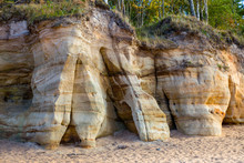 Sandstone Cliffs By The Sea