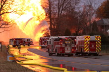Multiple Fire Engines Are Use To Attempt To Control A Major Gas Line Rupture And Fire.