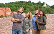 © Roman Babakin - Group of young friends looking up with interest