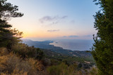 Fototapeta Na ścianę - Crete island beach and mountains in sunset time. Greece vacation.