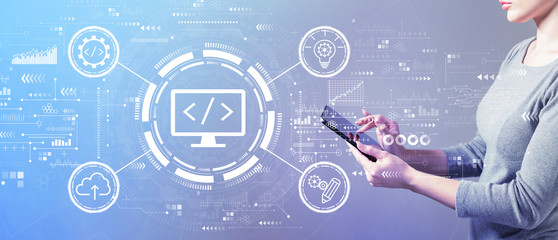 Wall Mural - Web development concept with business woman using a tablet computer