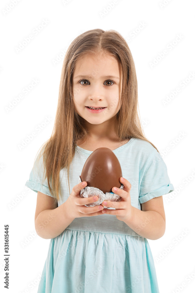 Cute little girl with sweet chocolate egg on white background