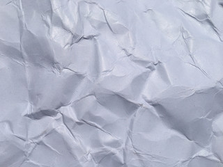 Top view of white crumpled paper texture background. Copy space for design and artwork