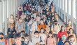 © tampatra - Bangkok City, Thailand : 03/12/2020 : Unidentified people, Crowd of Thai wearing face mask for health due to Coronavirus Disease or covid-19 and  air pollution in mass transit in public. Rush hour.