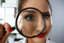 Funny Smiling Businesswoman Hold In Arm Magnifier At Workplace In Office Portrait Closeup. Searching Data At Online Hr Web About Head Hunter Concept