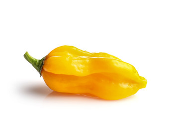 Wall Mural - Yellow chili pepper isolated on white background