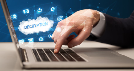 businessman working on laptop with decryption inscription, modern technology concept