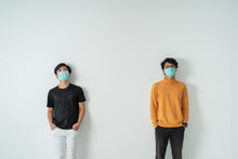 Social Distancing. People With Masks Keep Their Distance During Virus Symptoms