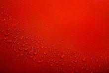 Water Drops On Red Background