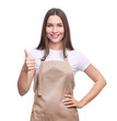 © LumenSt - Young woman in apron isolated on white background