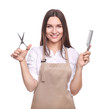© LumenSt - Young woman in apron isolated on white background. Hairdresser concept