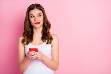 Sticker - Portrait of inspired positive girl use cellphone look copyspace think thoughts dream dreamy what post on social network account wear white singlet isolated over pink color background