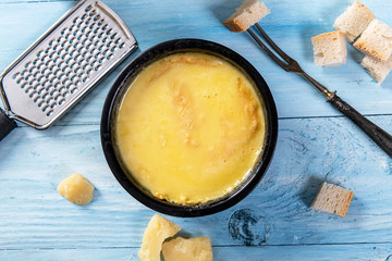 swiss fondue melted cheese served with bread