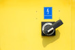 © diesirae - Yellow power supply switch box in the harbor