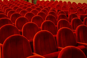 An empty auditorium in theatre. Empty seats in theatre. Theatre without audience.