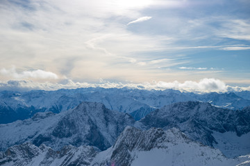 High alpine mountains with snow in Germany and blue beautiful sky