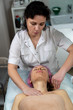 © Дмитрий Хитрин - Beautician makes a procedure for a girl to improve facial skin condition