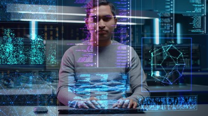 software programmer working on computer with neural networking, machine learning, big data, artifici
