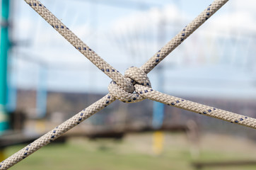 many ropes and one big knot close up