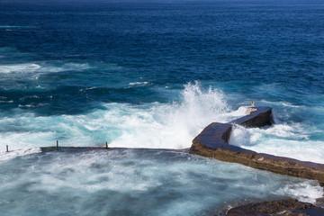 Wall Mural - wave splashes on stones at Tenerife island, Spain, Canary islands