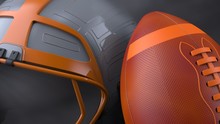 American Football Gray-Orange Helmet And Blown-Orange Ball With Dark Black Toned Foggy Smoke Under Black-white Laser Lighting. 3D Illustration. 3D High Quality Rendering.