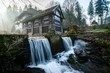 Old woody cottage with waterfall in foreground, mountains, Czech Republic, Europe, Peklo