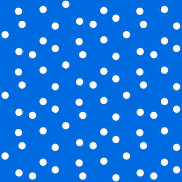 Blue bright background in white dots polka seamless pattern