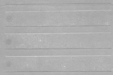 Cardboard white texture close-up. Light old paper background. Grunge concrete wall. Vintage blank wallpaper.