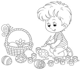 Wall Mural - Happy little boy getting ready for the holiday, coloring and decorating Easter eggs with a paintbrush and bright and colorful paints, black and white vector cartoon illustration for a coloring book