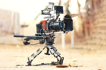 Film industry. Filming with professional camera background