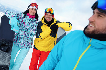 Sticker - Group of friends with equipment in snowy mountains. Winter vacation