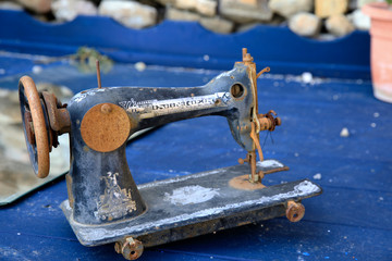 Wall Mural - Bussana Vecchia (IM), Italy - December 12, 2017: An old sewing machine in Bussana Vecchia, Imperia, Liguria, Italy