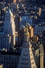 Fototapete - View over building tops at night, New York City, NY