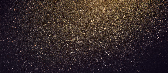festive banner with golden shiny paint splashes. abstract cosmos