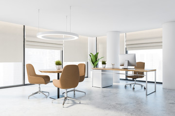 White CEO office with columns and round table