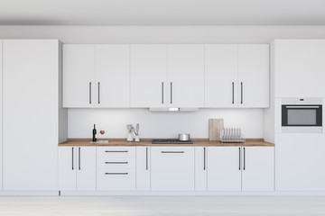 White and wood modern kitchen with countertops