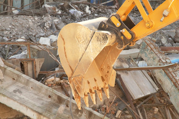 Wall Mural - large bucket of a modern excavator after hard work