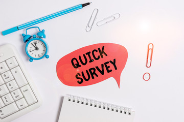 Text sign showing Quick Survey. Business photo text questionnaire that the target audience can complete right away Copy space on the empty note paper with pc keyboard clock and pencil on the table