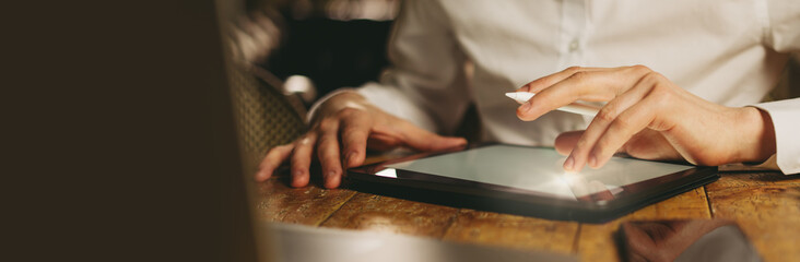 Wall Mural - Male hands with digital tablet