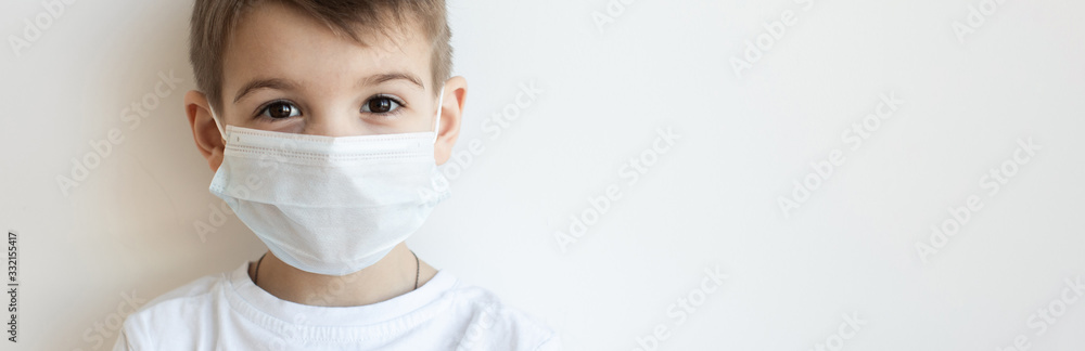 Concept of coronavirus quarantine. Child in mask . Protection against virus, infection. Health. Medical virus poster design - obrazy, fototapety, plakaty 