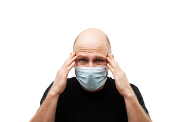 Wall Mural - Young adult bald head man wearing respiratory protective medical mask