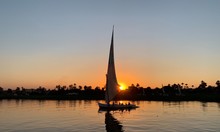 Sailboat At Sunset On River Nile Egypt