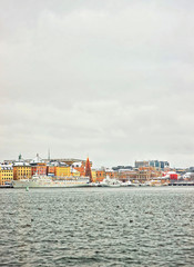 Wall Mural - Evening scenery of the Old City of Stockholm with a Christmas tree in Sweden in wintertime