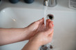 © Andrey - hand washing, female hands squeeze foam
