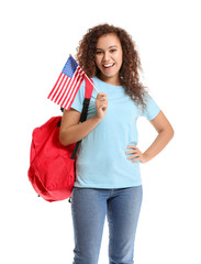 Canvas Print - Female African-American student of language school on white background