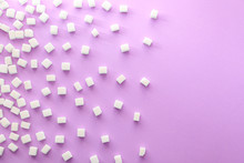 Cubes Of Sweet Sugar On Color Background