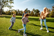 © Svitlana - Where care and play go hand in hand. Excited family having fun outdoors on a sunny day