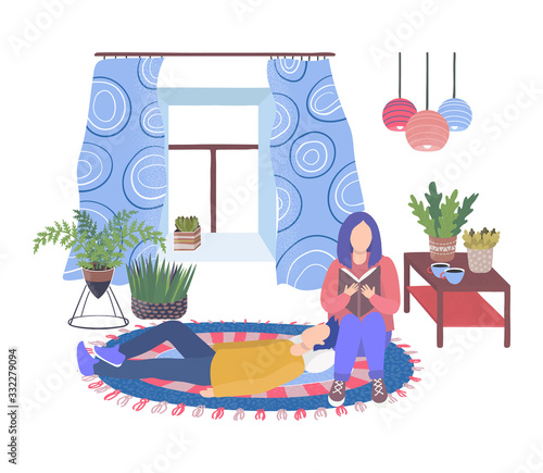 House plants in living room and couple man resting and woman reading book iso...