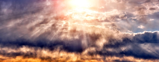 Wall Mural - stormy sunset sky landscape background natural color of evening cloudscape panorama after storm with