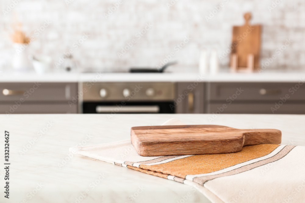 Cutting board and napkin on kitchen table